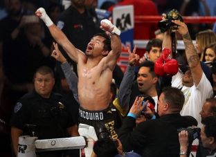 Pacquiao i rikthehet ringut, fiton titullin WBO